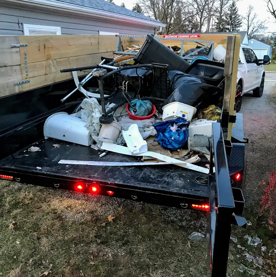 Roll-off dumpster delivered to a residential driveway in Stanford